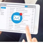 Person opening their email on a tablet