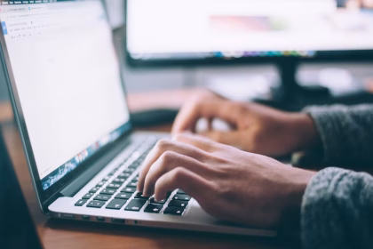 man working on open laptop